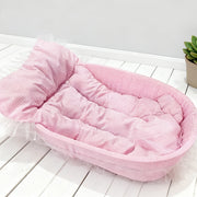 Soft oval plush pet bed with lace trim for small dogs and cats cozy indoor cushion