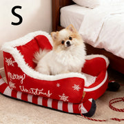 Holiday-themed pet bed in sled shape for small dogs and cats
