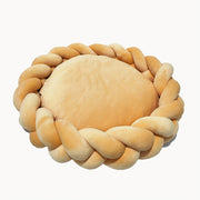 Handwoven-style circular pet bed with removable cover