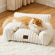 Fluffy cat couch with corduroy cover and washable bed