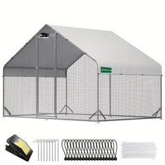 Walk-in metal chicken coop with attached run and solar-powered lighting