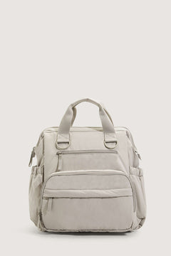 Baby care backpack with stroller attachment