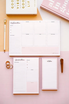 Set of three desktop planners with weekly and daily layouts