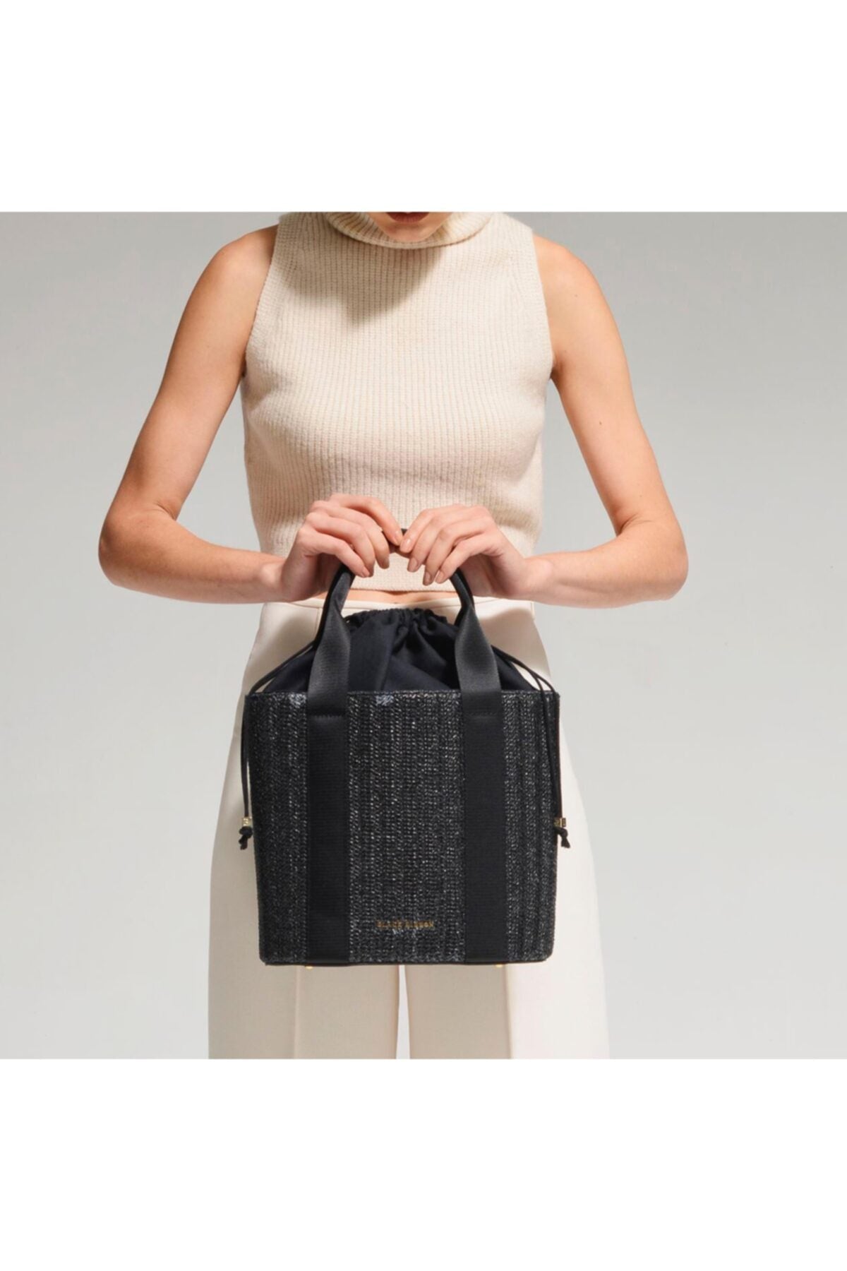 Stroheimer-Handtasche
