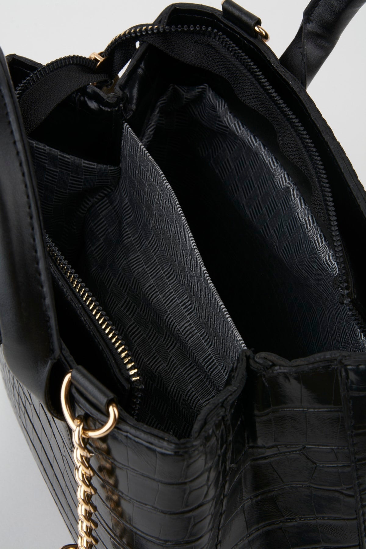 Damen-Hand- und Schultertasche aus schwarzem Kunstleder mit Kroko-Muster und Druckknöpfen