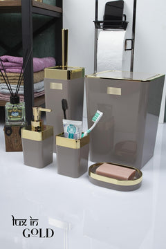 5-piece bathroom accessories set in brown and gold tones