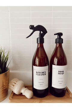 Amber glass soap dispenser and kitchen cleaner bottle with wood lid