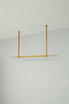 Ceiling-mounted adjustable service stand with gold finish