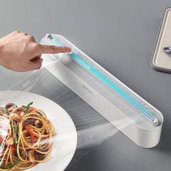 Plastic wrap dispenser with built-in cutter for effortless kitchen use