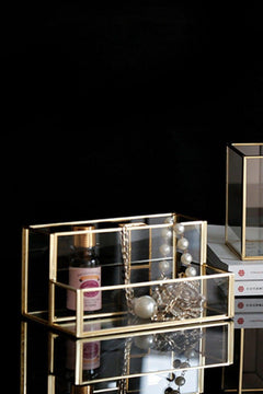 Gold-tone makeup brush organizer with mirror base