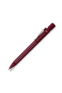 Soft-grip triangular ballpoint pen in vibrant red or blue