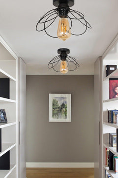 Single black metal ceiling mounted light fixture