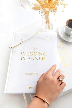 Wedding planning notebook with hardcover and gilded accents