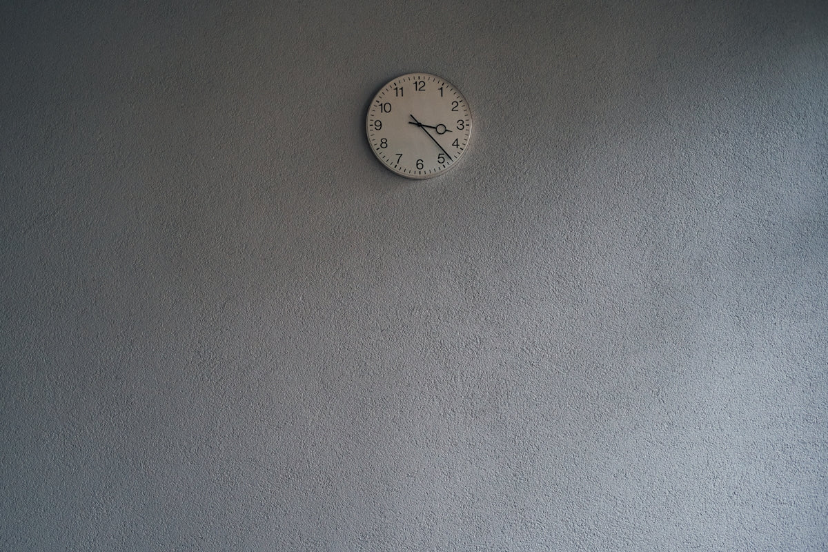 A clock on the wall of a room