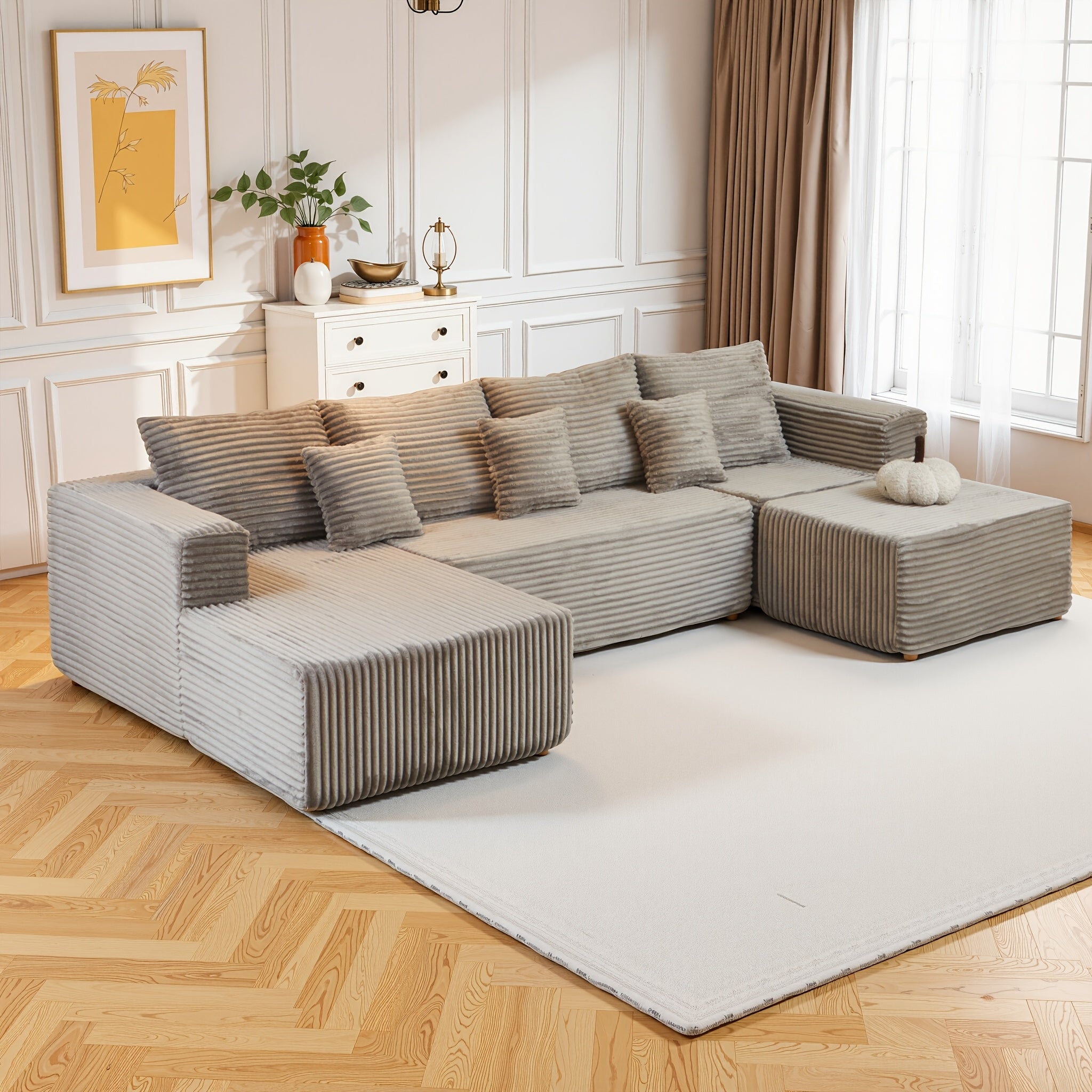 Modular L-shaped chaise longue sofa bed with deep seat and corduroy upholstery