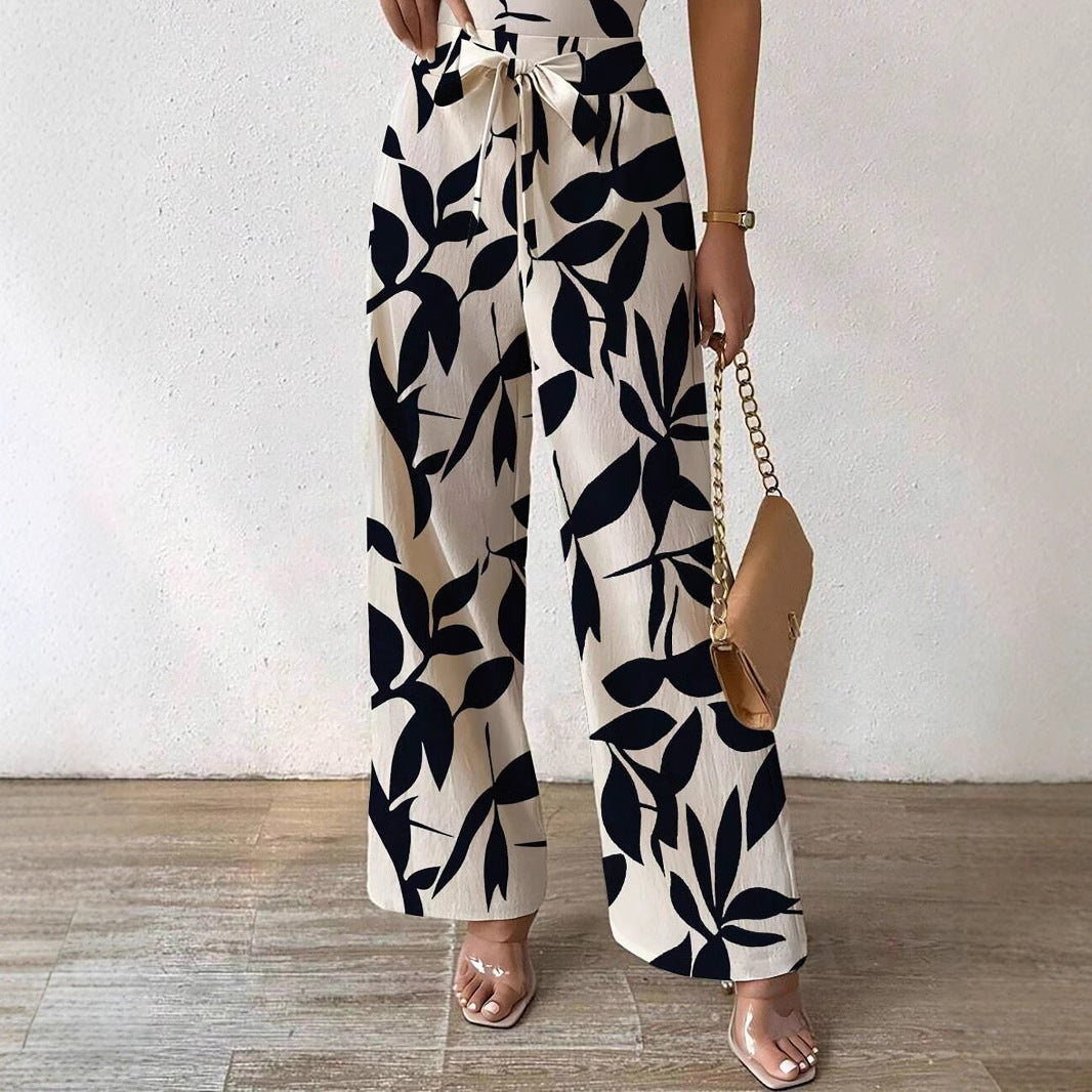 Chic Floral Print Sleeveless Jumpsuit with Belt