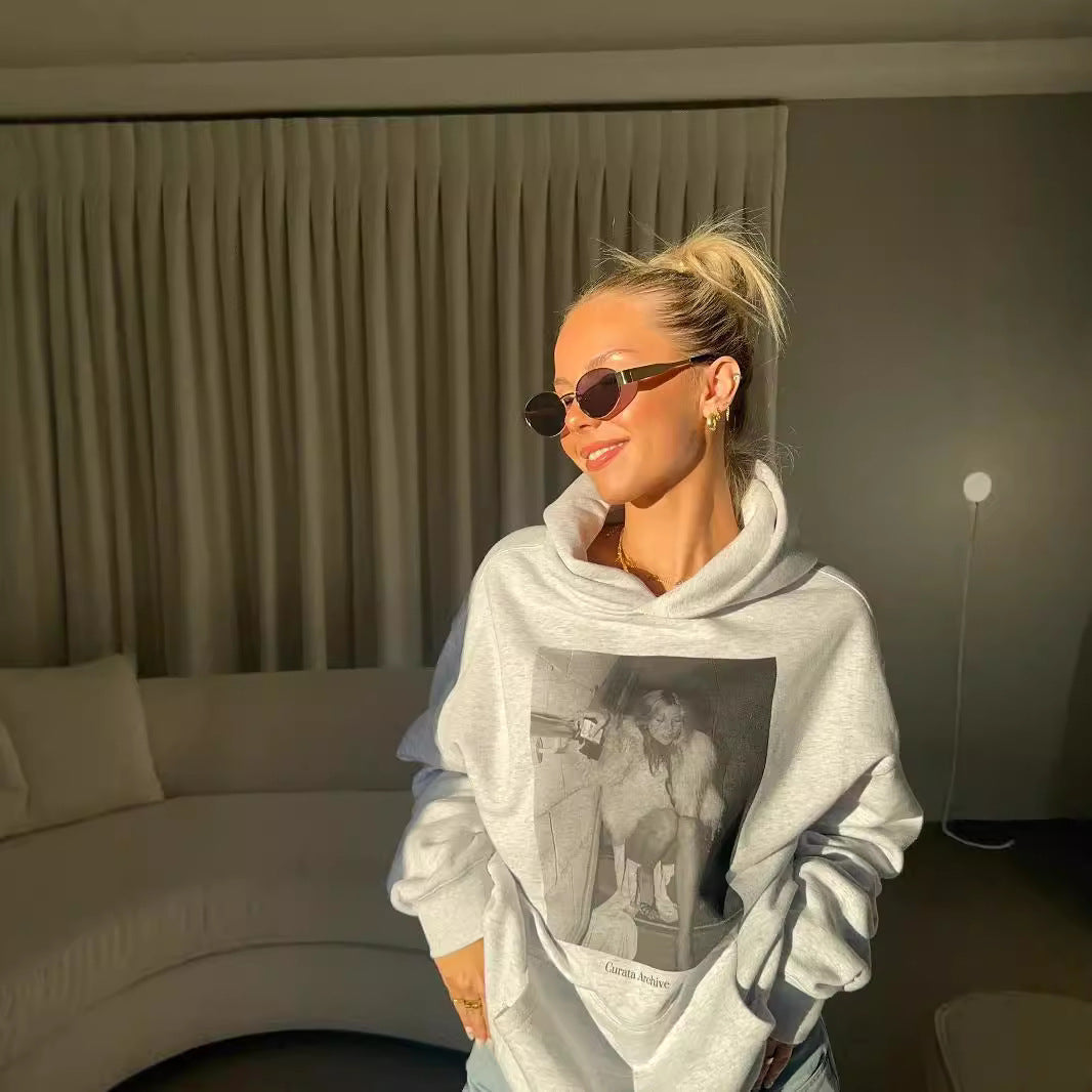 Trendy Hooded Graphic Sweatshirt for Casual Comfort