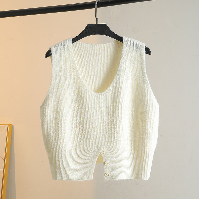Layering a Sweater Over a Waistcoat and Wearing a Slit V Neck Knitted Vest