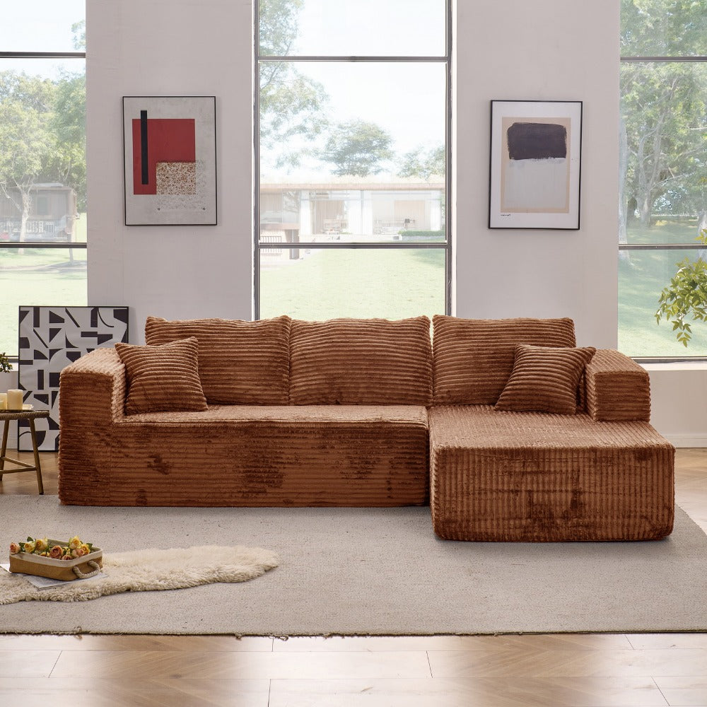 Modular L-shaped chaise longue sofa bed with deep seat and corduroy upholstery