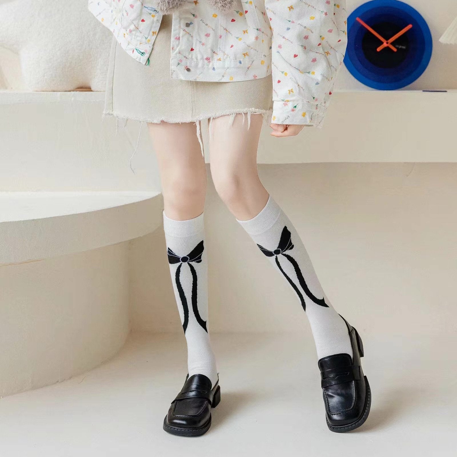 Cozy Winter Knee Socks for Women - Black & White Bow Design