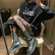 Black and White Fishnet Stockings with Cute Designs