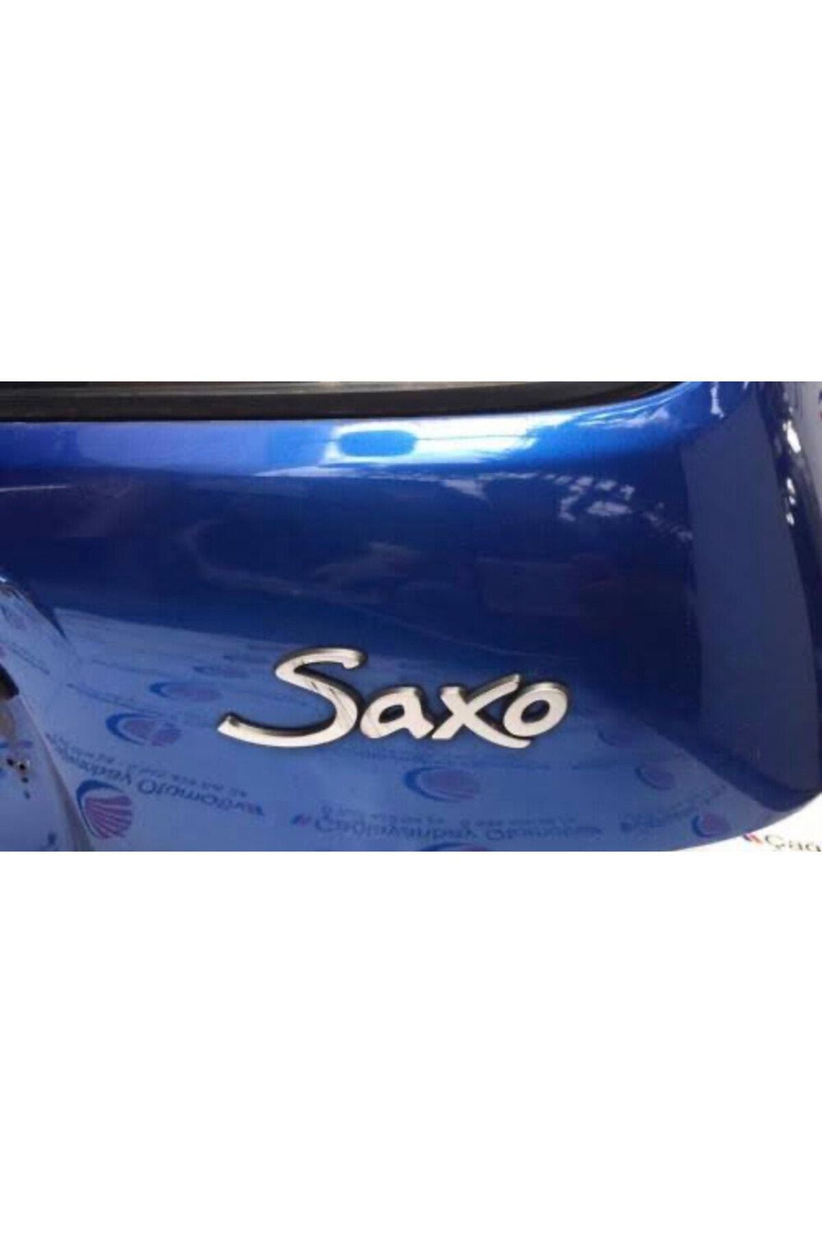 Saxo emblem badge