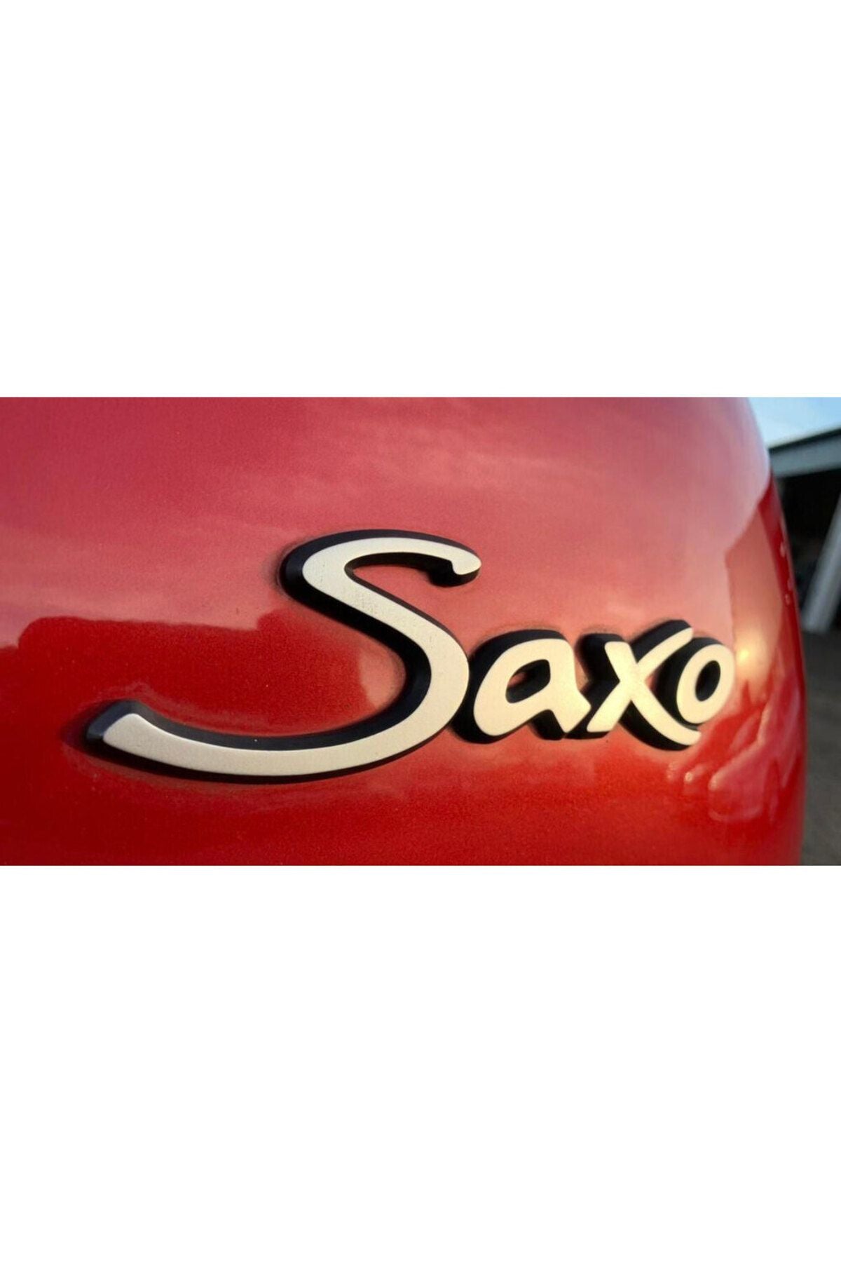 Saxo emblem badge
