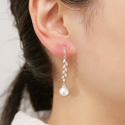 Add a Touch of Elegance with Long Dangle Simulated Pearl Earrings