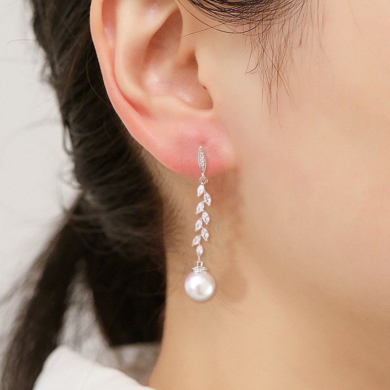 Add a Touch of Elegance with Long Dangle Simulated Pearl Earrings
