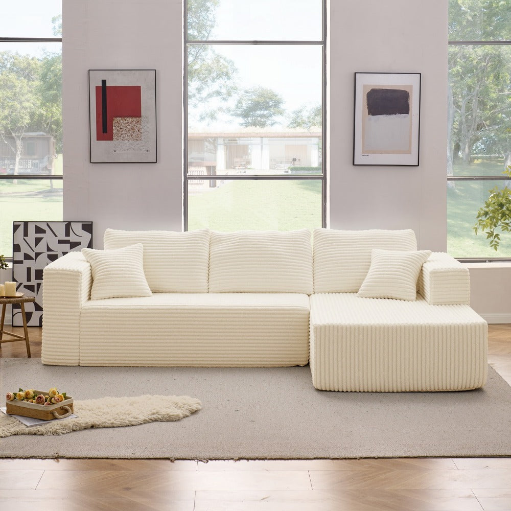 Modular L-shaped chaise longue sofa bed with deep seat and corduroy upholstery