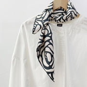 Add a Touch of Elegance with this Medium Twill Silk Scarf