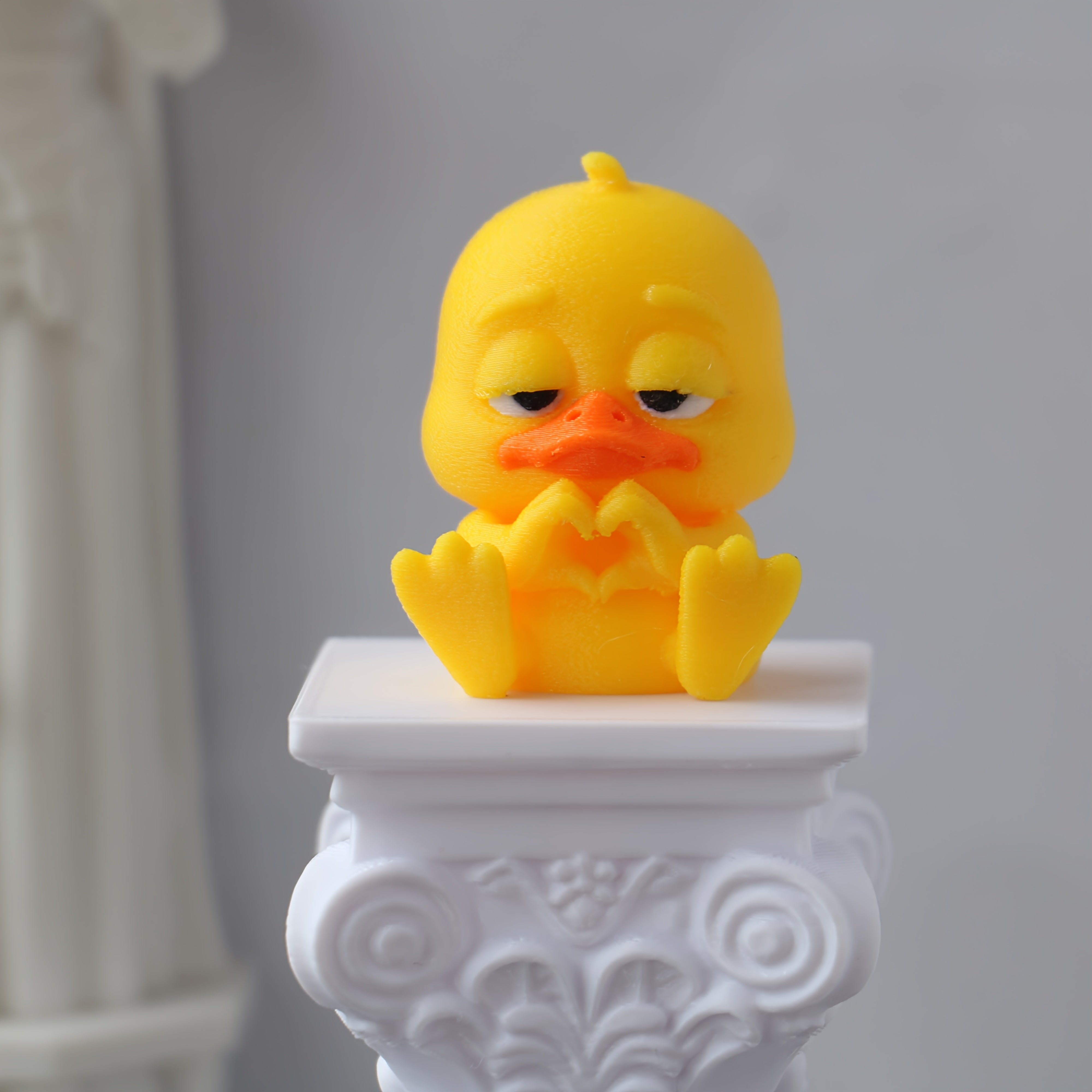 Love duck figurine with heart gesture for home decor and gifts
