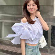 Asymmetric Off-the-Shoulder Blouse with Bow Tie