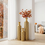 Set of 3 large hollow metal floor vases in gold finish