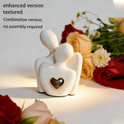 Modern love embrace sculpture with golden heart home decor