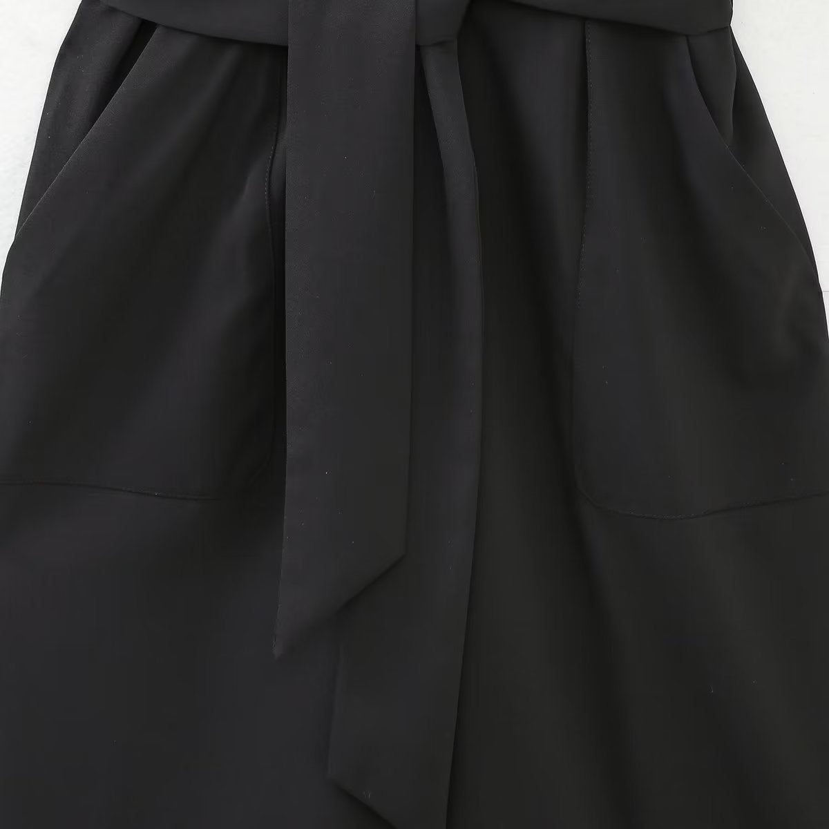Chic Short-Sleeve Belted Jumpsuit with Zipper & Lapel