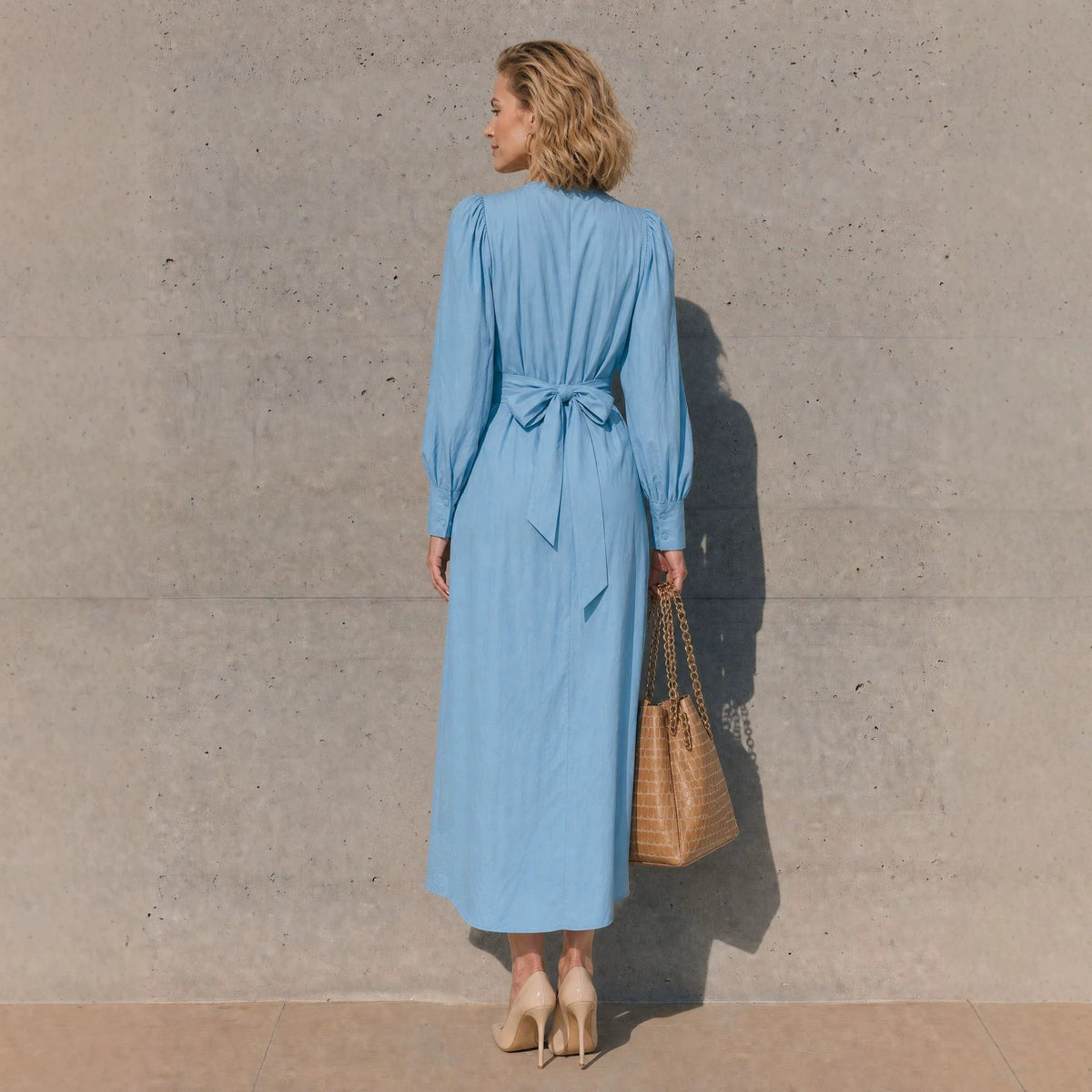 Long-sleeved, Waist-cinched Dress with a Tie and Bow Detail
