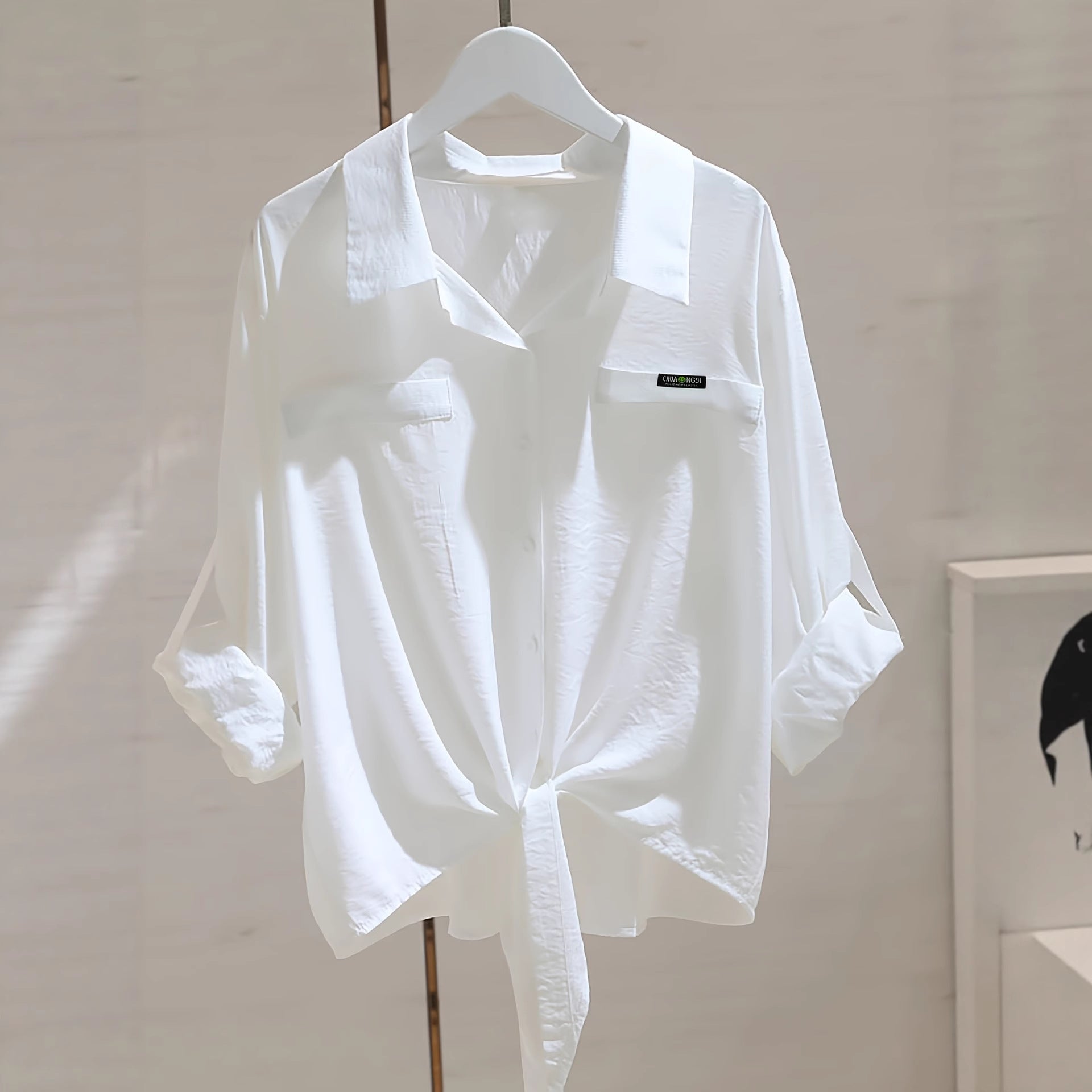 Stylish Womens Top With A Knotted Hem