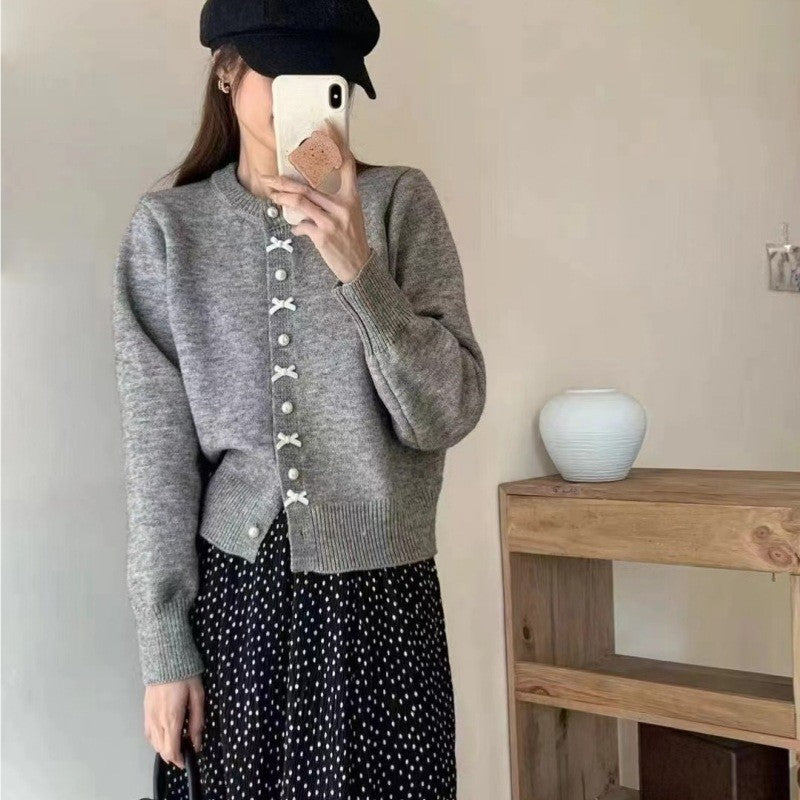 Women's Solid Color Spring and Autumn Bow Pearl Button Sweater
