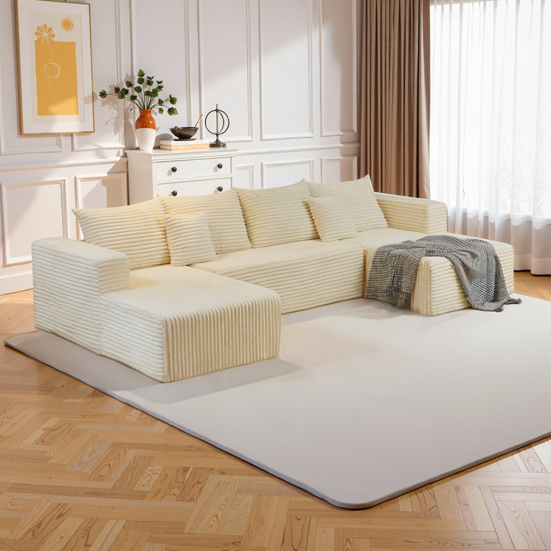 Modular L-shaped chaise longue sofa bed with deep seat and corduroy upholstery