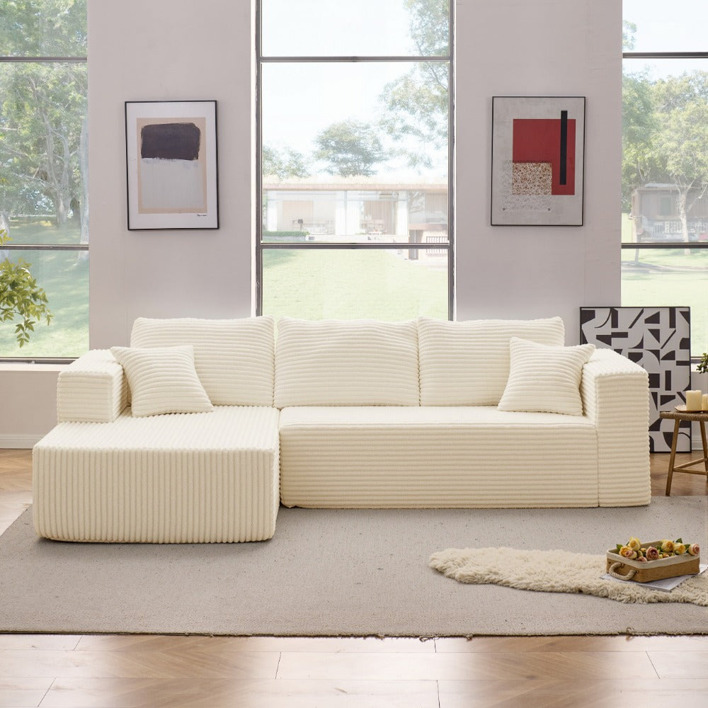 Modular L-shaped chaise longue sofa bed with deep seat and corduroy upholstery