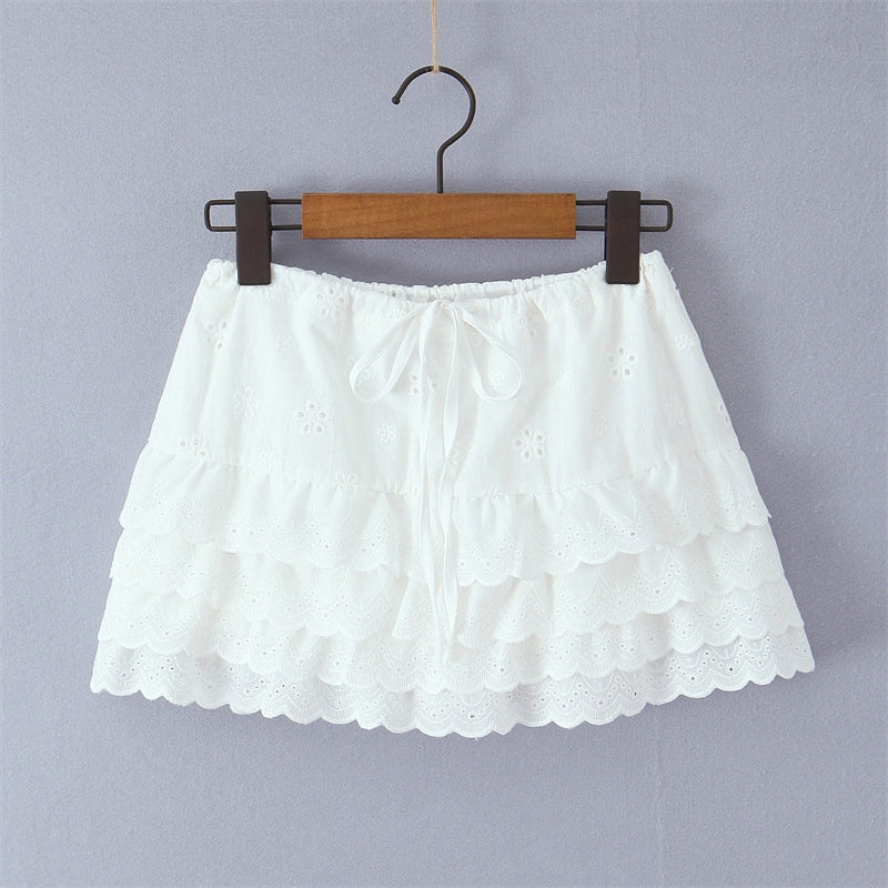 Lace-trimmed Waist-cinching Top And Embroidered Ruffled Short Skirt