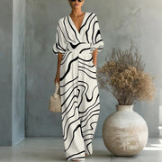Printed V-Neck Waist-Cinched Wide-Leg Jumpsuit