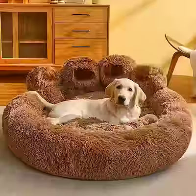 Donut-shaped pet bed with plush lining for dogs and cats