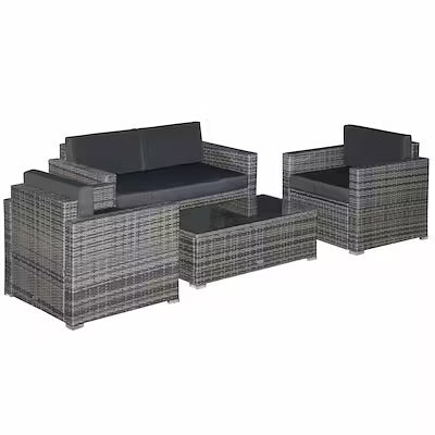4-piece wicker patio furniture set with cushions and glass coffee table