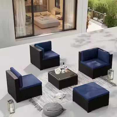 5-piece outdoor sectional patio set with cushioned sofa and glass-top table