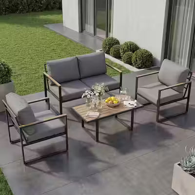 Grey outdoor conversation sofa set with matching table