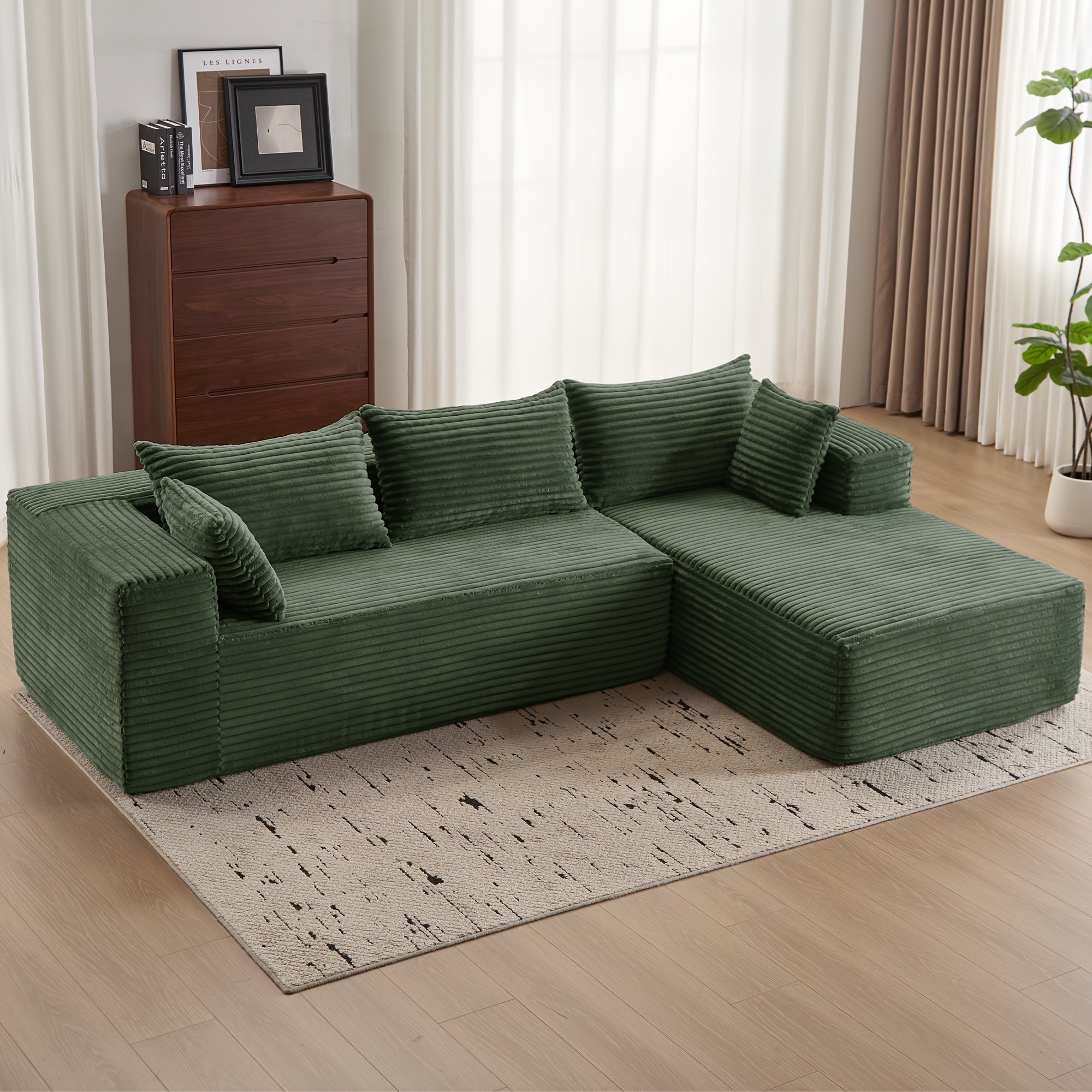 Modular L-shaped chaise longue sofa bed with deep seat and corduroy upholstery