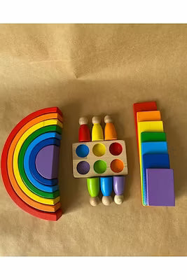 Handcrafted Waldorf rainbow and peg doll play set for sensory learning