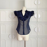 Sleeveless Chiffon Top With A Chic Ruffled Trim